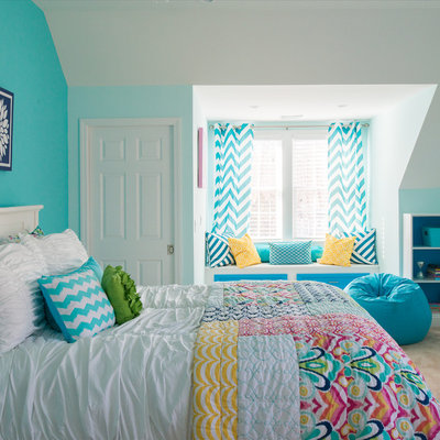 Large transitional girl carpeted and beige floor kids' room photo in New York with blue walls