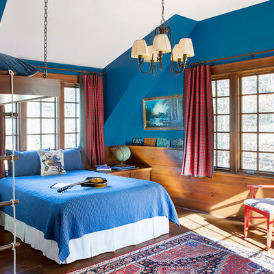 Kids' bedroom - mid-sized traditional boy medium tone wood floor kids' bedroom idea in Boston with blue walls