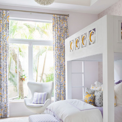 Kids' room - mid-sized contemporary girl carpeted kids' room idea in Miami with purple walls