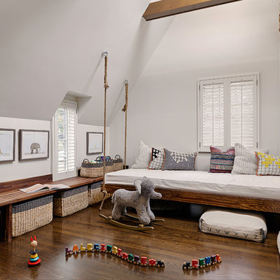 Mid-sized transitional gender-neutral dark wood floor and brown floor kids' room photo in Other with white walls