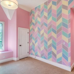 Immagine di una cameretta per bambini da 4 a 10 anni bohémian con pareti rosa