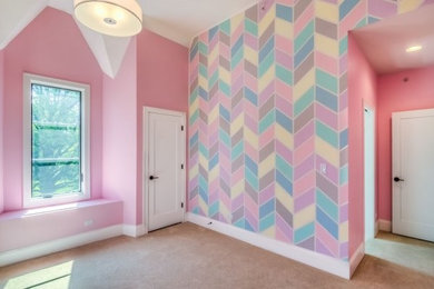 Inspiration for an eclectic children’s room for girls in Chicago with pink walls.