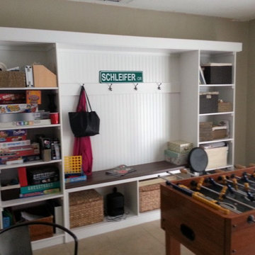 Custom built bench with shelving and coat hooks
