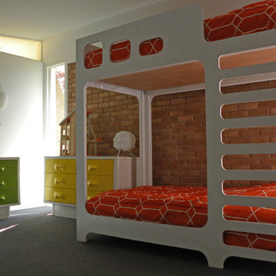 Kids' room - 1950s gender-neutral carpeted and red floor kids' room idea in Dallas with white walls