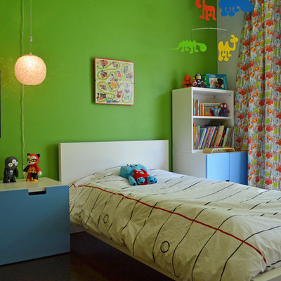 Example of a mid-century modern boy kids' room design in Dallas with green walls