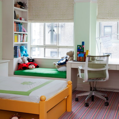 Example of a small transitional girl carpeted kids' room design in New York with green walls