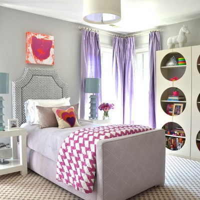 Example of an eclectic girl carpeted and multicolored floor kids' room design in New York with gray walls