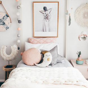 This is an example of a mid-sized contemporary kids' room for kids 4-10 years old in Melbourne with white walls.