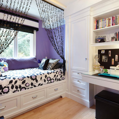 Kids' room - mid-sized traditional girl light wood floor kids' room idea in Toronto with multicolored walls