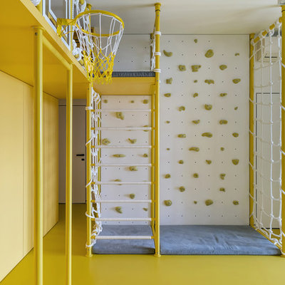 Playroom - modern yellow floor playroom idea in Miami with yellow walls