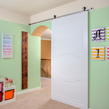 Family Home Playroom with Sliding Barn Door