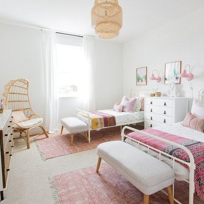 Inspiration for a transitional girl carpeted and beige floor kids' room remodel in Sacramento with white walls