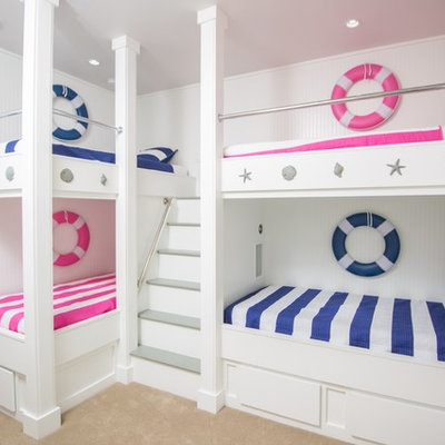Inspiration for a mid-sized coastal gender-neutral carpeted and beige floor kids' room remodel in Jacksonville with white walls
