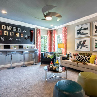 Inspiration for a large transitional kids' room for girls in Tampa with beige walls and carpet.
