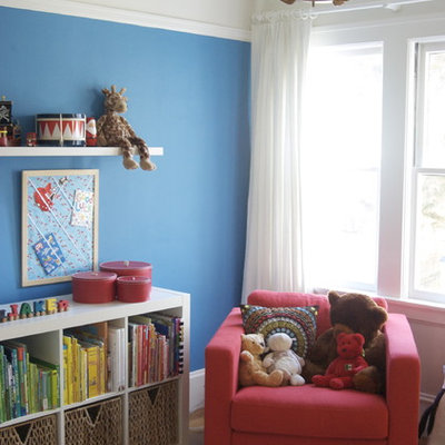 Trendy kids' room photo in San Francisco with multicolored walls