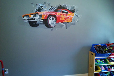 Four-year-old boy's bedroom ural of Hot Wheels car crashing through the wall.
