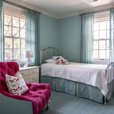 Inspiration for a mid-sized timeless girl carpeted and blue floor kids' room remodel in Minneapolis with blue walls