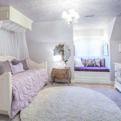 Example of a classic girl carpeted kids' room design in Detroit with purple walls