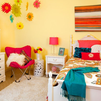 Kids' room - mid-sized traditional girl carpeted kids' room idea in Dallas with yellow walls