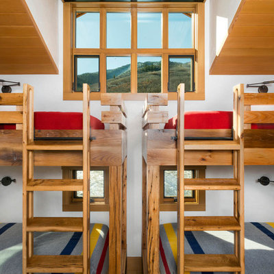 Mountain style gender-neutral kids' bedroom photo in Denver with white walls