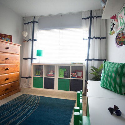 Mid-sized eclectic boy carpeted kids' room photo in San Diego with gray walls