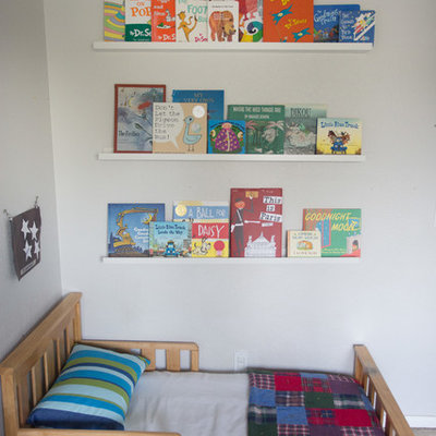 Example of a mid-sized eclectic boy carpeted kids' room design in San Diego with gray walls