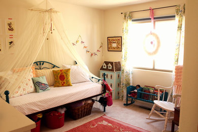 This is an example of an eclectic kids' bedroom for girls in Albuquerque.