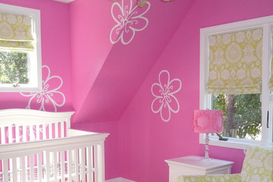 Kids' bedroom - small contemporary girl carpeted kids' bedroom idea in Detroit with multicolored walls