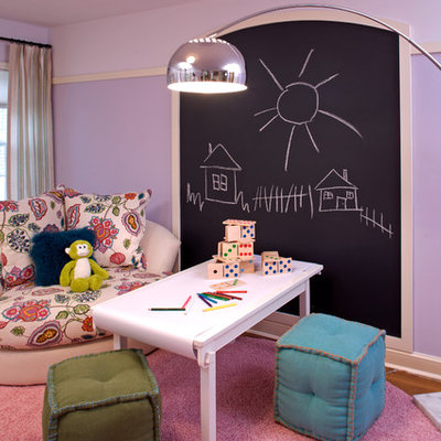 Trendy gender-neutral medium tone wood floor kids' room photo in Minneapolis with purple walls