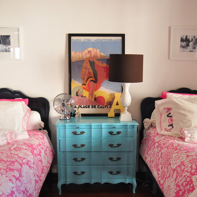 Kids' room - mid-sized traditional girl dark wood floor kids' room idea in Austin with white walls