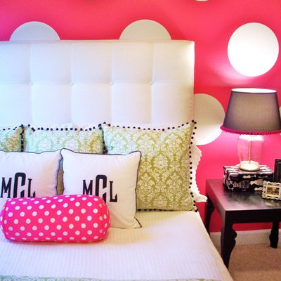 Inspiration for a contemporary girl carpeted kids' room remodel in Charlotte with pink walls