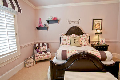 Inspiration for a mid-sized girl carpeted kids' room remodel in Charlotte