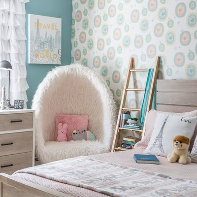 Kids' room - transitional girl kids' room idea in New York with multicolored walls