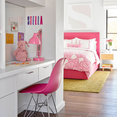 Large trendy girl dark wood floor kids' room photo in Dallas with white walls