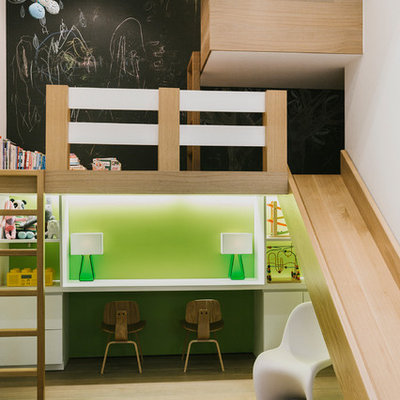 Inspiration for a large contemporary gender-neutral light wood floor and beige floor kids' room remodel in New York with black walls