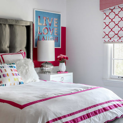 Inspiration for a mid-sized transitional girl dark wood floor and brown floor kids' room remodel in New York with pink walls