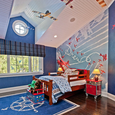 Example of a classic boy kids' room design in Los Angeles with multicolored walls