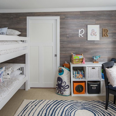 Example of a small beach style gender-neutral carpeted kids' room design in Calgary with multicolored walls