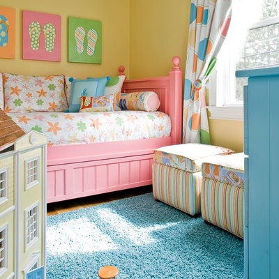 Inspiration for a large timeless girl carpeted kids' room remodel in Boston with yellow walls