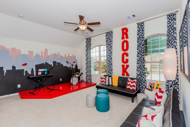 Elegant gender-neutral carpeted and beige floor playroom photo in Houston with multicolored walls