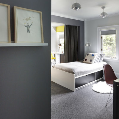 Inspiration for a large modern boy carpeted and gray floor kids' room remodel in Toronto with gray walls