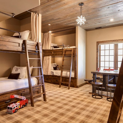 Kids' room - mid-sized rustic gender-neutral carpeted and multicolored floor kids' room idea in Chicago with beige walls