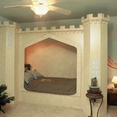 Example of a large classic boy carpeted kids' bedroom design in Houston with blue walls