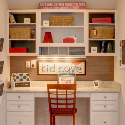 Inspiration for a timeless gender-neutral medium tone wood floor kids' study room remodel in Other with white walls