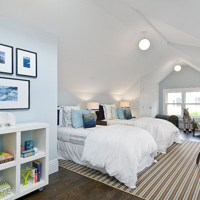 Inspiration for a timeless gender-neutral dark wood floor kids' room remodel in San Francisco with blue walls