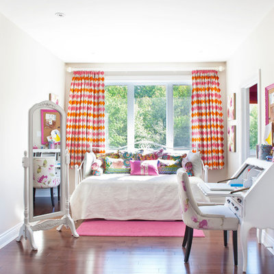 Example of a classic girl kids' bedroom design in Montreal with gray walls