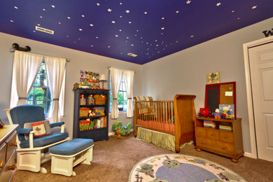 Inspiration for a timeless gender-neutral carpeted kids' room remodel in Baltimore with gray walls