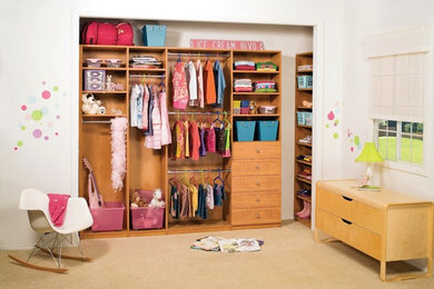 Mid-sized transitional girl carpeted kids' room photo in Dallas with beige walls