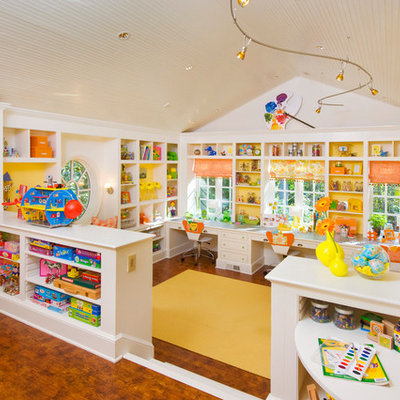 Large transitional gender-neutral medium tone wood floor playroom photo in Atlanta with white walls