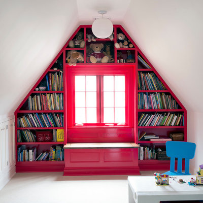 Kids' room - mid-sized traditional gender-neutral carpeted kids' room idea in New York with red walls
